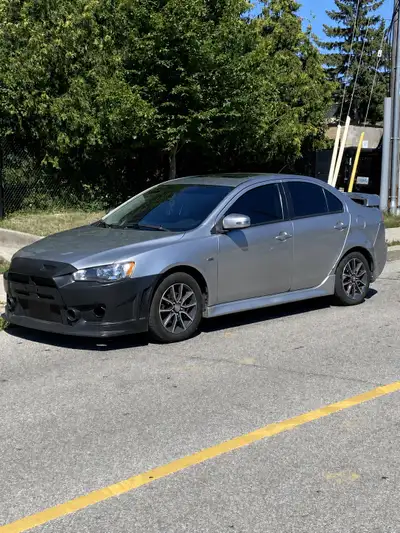 Selling my Mitsubishi Lancer with approximately 211,370 km. It has a manual transmission and is very...