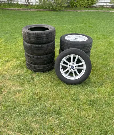 2-Sets of tires and aluminum rims. Came off a 2018 Ford Focus. 4 of the tires on the rims are worn a...