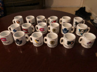 Set of 18 vintage NHL mini mugs.