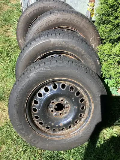 Cooper Winter tires on rims. . 5x115 bolt pattern. Was on Pontiac Torrent. Good for another winter....