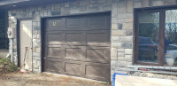 Two 9x7' steel garage doors