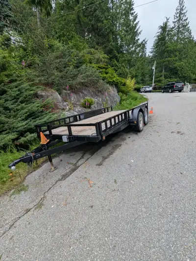 A very solid trailer, 16' double axle, 8' wide total. Load Trail landscape trailer with 2 X 3500 in...