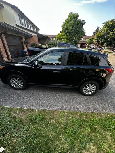 Reliable 2016 Mazda CX-5 in black. This SUV has an all-wheel drive system and Skyactiv technology. T...