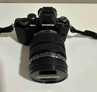 Olympus Mirrorless Camera with 3 lenses 
