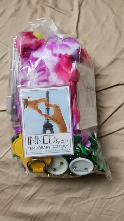 Assorted Bag of Costume Jewlery, cosemtics, & trinkets, View more