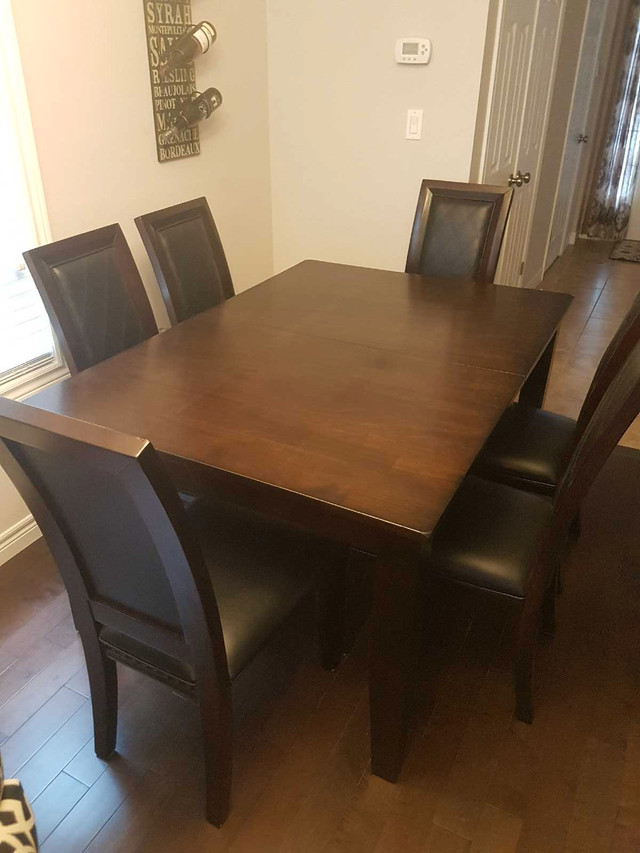 Solid Wood Table With Folding Center Addition and 6 Chairs. in Dining Tables & Sets in Hamilton