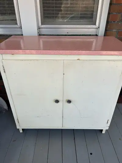 FREE vintage utility storage cabinet for shed or garage. Sides and shelving are metal. Back and door...