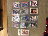 Sports cards for sale, jerseys, autographed picture.