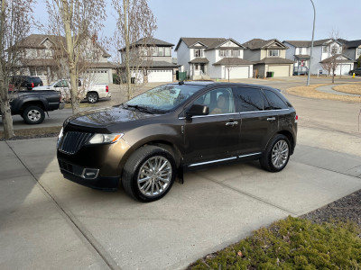 2011 Lincoln MKX in sophisticated brown. 
