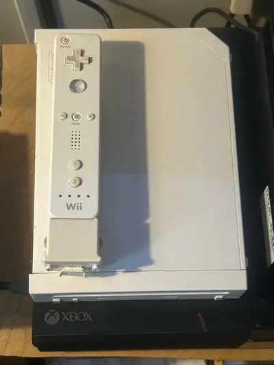 Don’t have the sensor bar or nunchuk but come with power bar and controller system works good 40$ or...