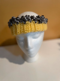 Fall is here, keep your ears, warm with this hand-knit band