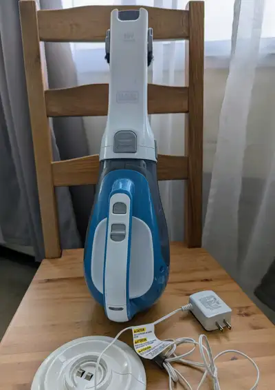 Some scuffs and scratches, but it works and holds a charge quite well. Comes with its own charger. F...