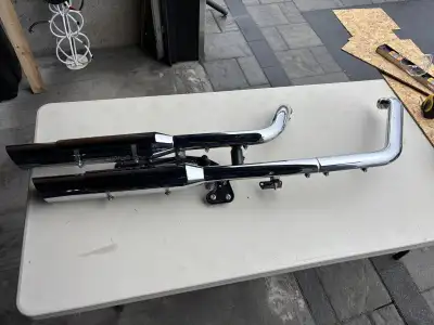 Should fit 2012-2017 Harley Davidson Softail Slims. Used 3 months. Stock Exhaust