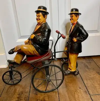 Vintage Laurel and Hardy Collectible Figures on Bicycle, View more