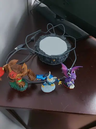 Dive into the Skylanders universe with this set, featuring a portal and three unique figures! This s...