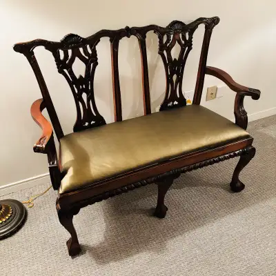 All original antique 2 seat Chippendale. Recently refinished, upgraded with a reinforced seat, and u...