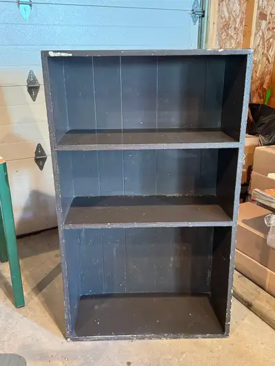 Simple, sturdy wooden bookshelf with three spacious shelves. This versatile piece works well for boo...