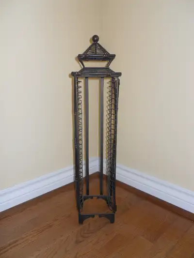 Pagoda style metal tower in very good condition. Blends in with the furniture. Holds 28 CD's. Height...