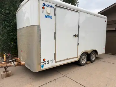 Royal 16 ft cargo / enclosed trailer, extra height 8 ft inside with a 89 inch high ramp door, extra...