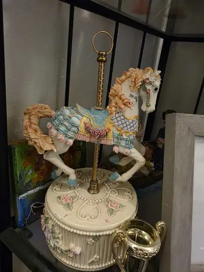 Musical spinning horse, View more