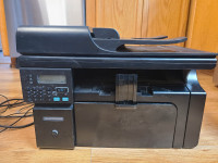 laserjet m1212nfmfp all in one printer, scanner and fax.