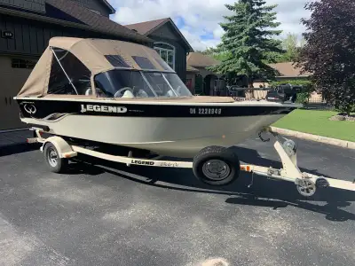 2009 Legend 18’ Excalibur aluminum boat c/w 90 hp mercury engine, trailer, mooring cover. Motor has...