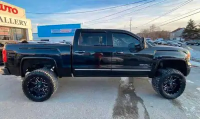 2015 GMC Sierra 1500 Denali, a robust pickup truck equipped with a powerful engine and luxurious fea...