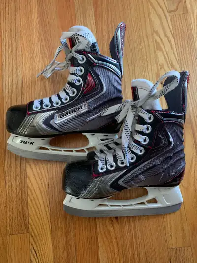 Kids hockey skates ( sz 11) and hockey helmet(sz youth), View more