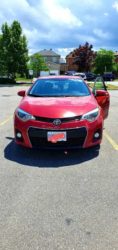 This is a 2015 Toyota Corolla S, full option, leather heated seats (front) offering reliability and...