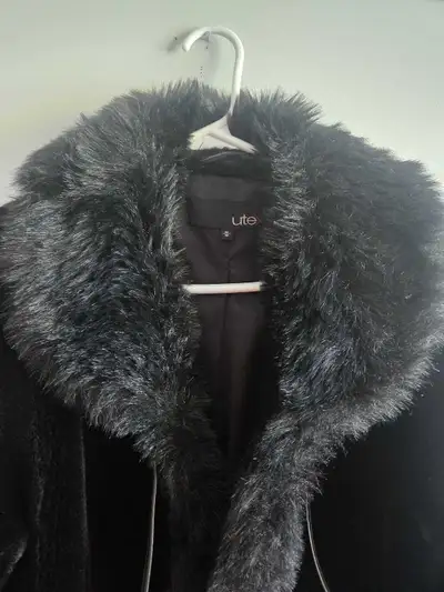 Women coat . Used once on wedding . Size: Medium Colour: Black