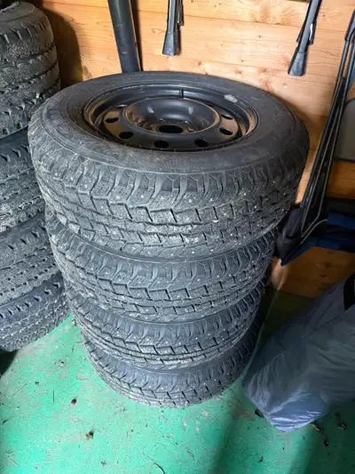 Selling a set (4) of studded winter tires and rims. 245/70/17, in very good condition with limited u...