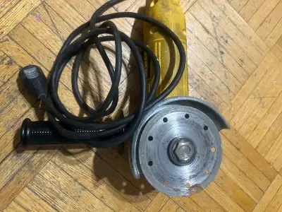 I'm selling a Dewalt angle grinder, perfect for cutting and grinding various materials. This tool ha...