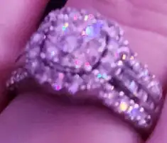 This is an absolutely gorgeous engagement ring featuring an arrangement of sparkling stones, perfect...