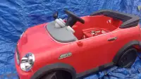 I deliver! Mini-cooper Red Toy Car)