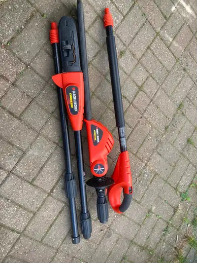 B&D pole saw and hedge trimmer with extension and storage/safety shields. Comes with a drill and 2 b...