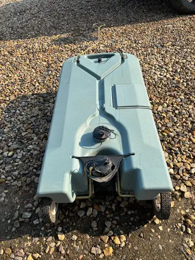 Two RV sewer totes for sale. Both in excellent shape. The light coloured one is a 35 gallon for $375...