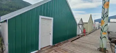 Double slip boat house. 25ft wide, 30ft deep and Newer flotation. Births are 23ft deep and 8ft wide....