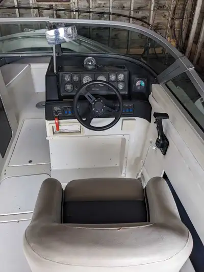 Selling a 22-foot bowrider boat equipped with a powerful 5.7L Mercruiser I/O engine, perfect for wat...