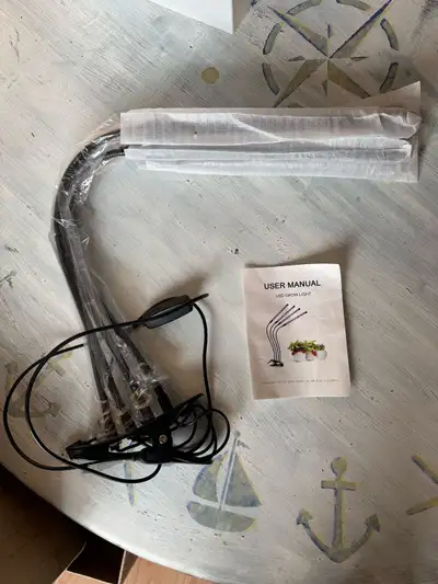 I'm offering a brand new LED grow light, perfect for indoor plants needing that extra boost! This gr...