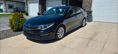 Low mileage, One owner, Mint condition Kia Optima fully loaded.