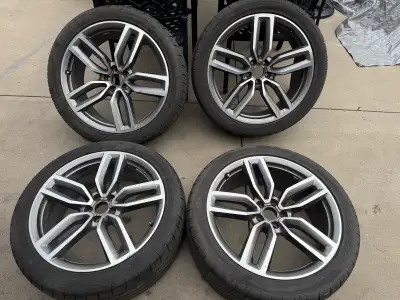 Full set of OEM Audi wheels with tires used for one summer season. Pictures of each rim included as...