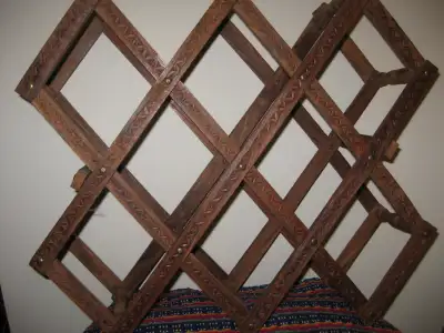 Wooden Wine Rack / Towel holder Solid wood. Holds 8 bottles / towels. Beautifully carved. Joints mov...