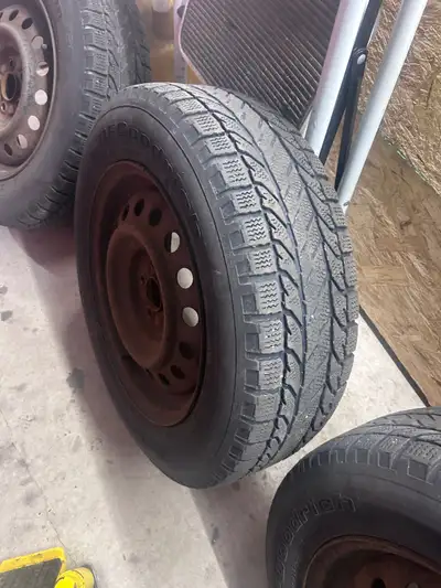 Snow tires off of 2009 Toyota matrix Will fit other vehicles ex Pontiac vibe, maybe Toyota Corolla.,...