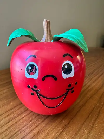 Vintage 1972 Fisher-Price Happy Apple chime toy with short stem, View more