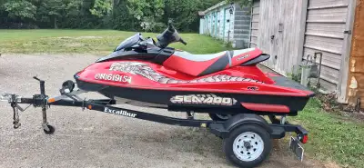Personal watercraft with trailer. Includes safety kit, Dock line, anchor and 1lt bottle of injection...