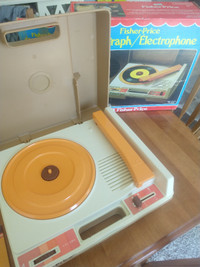 Fisher Price phonograph with records