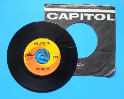 The Beatles 45, She loves you / I'll get you 1964 Capital Record, View more