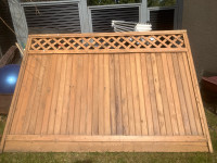 One six foot cedar fence panel and one cedar and metal gate