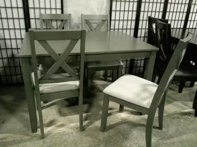 This table set features an espresso or Grey finish. Package price includes –Dining table with 4 soli...