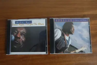 Two excellent Silvertone CDs from blues master statesman Buddy Guy. 1991's Damn Right, I've Got The...